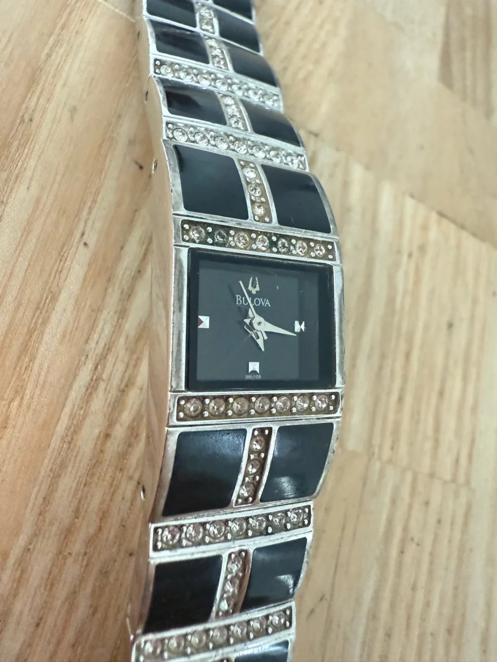 Bulova ladies rectangular silver tone crystal accented watch NEW BATTERY